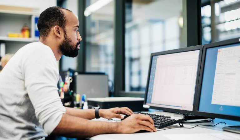 Man Working On Computer